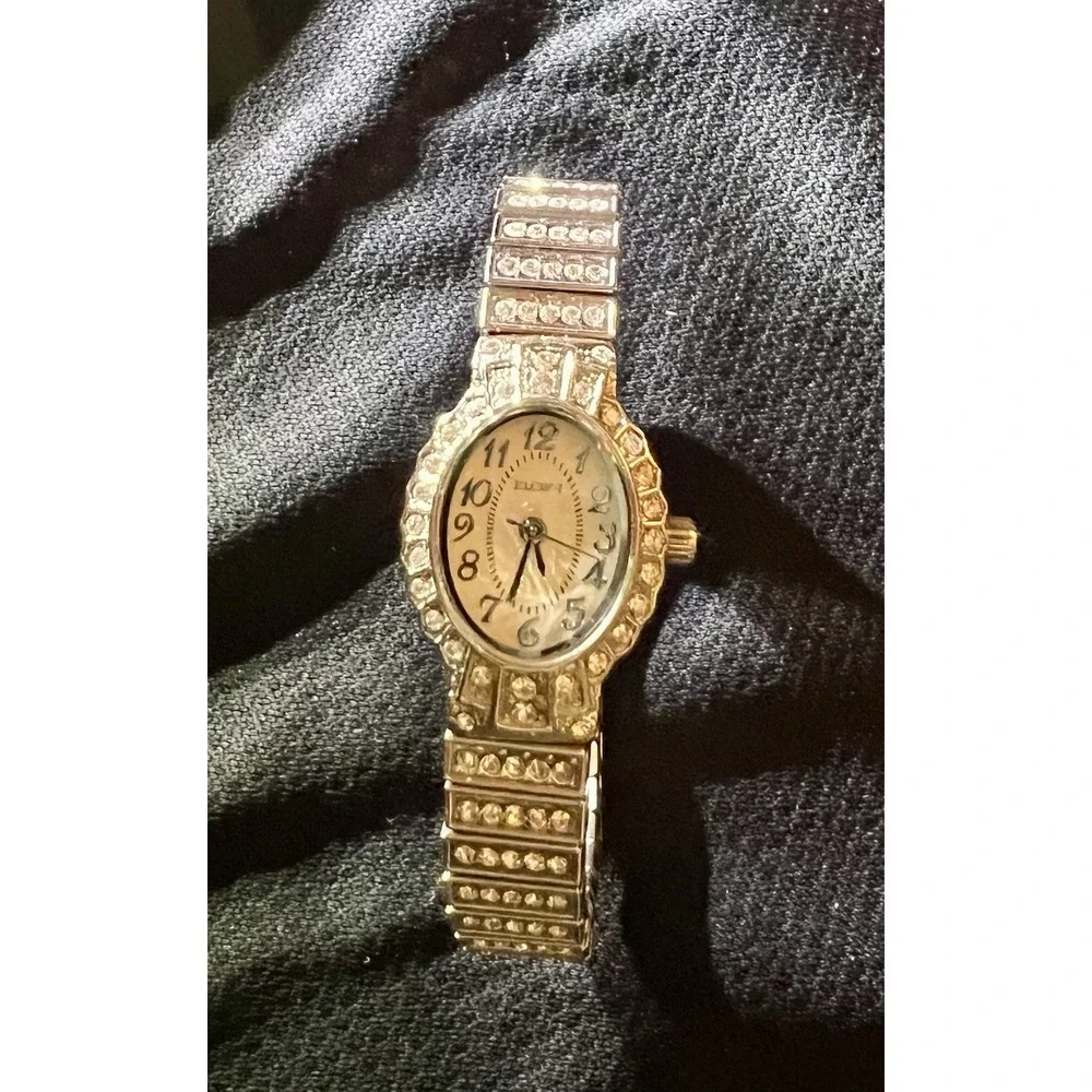 Elgin EG9058 Women's Oval Analog Clear Stone White Dial Stretch Band Bling Watch